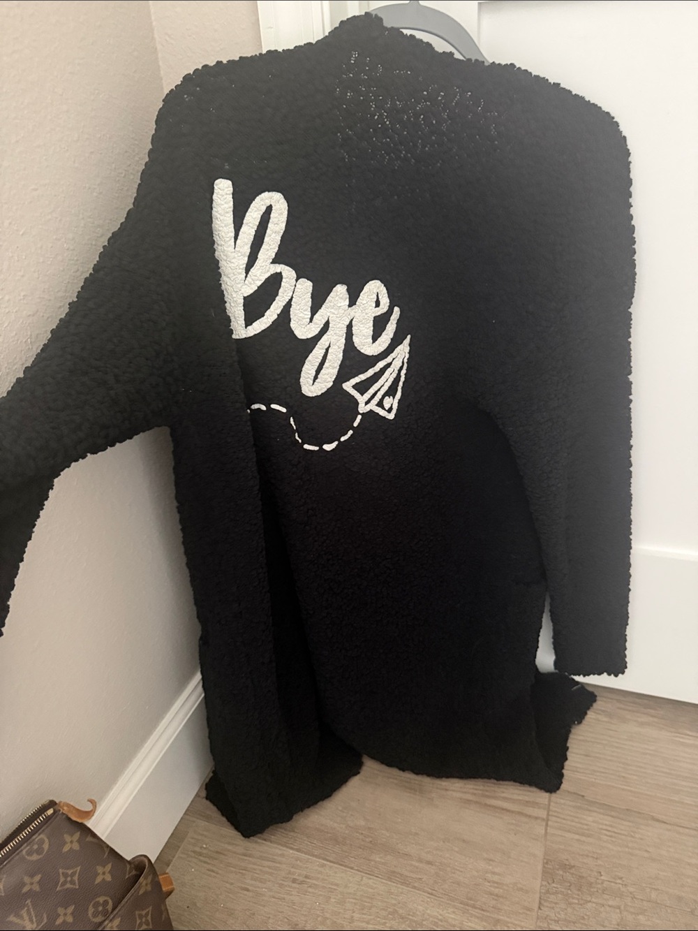 Black Sherpa Cardigan with 'Bye' Script